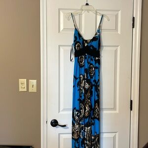 Ladies floral maxi dress with beaded accents.